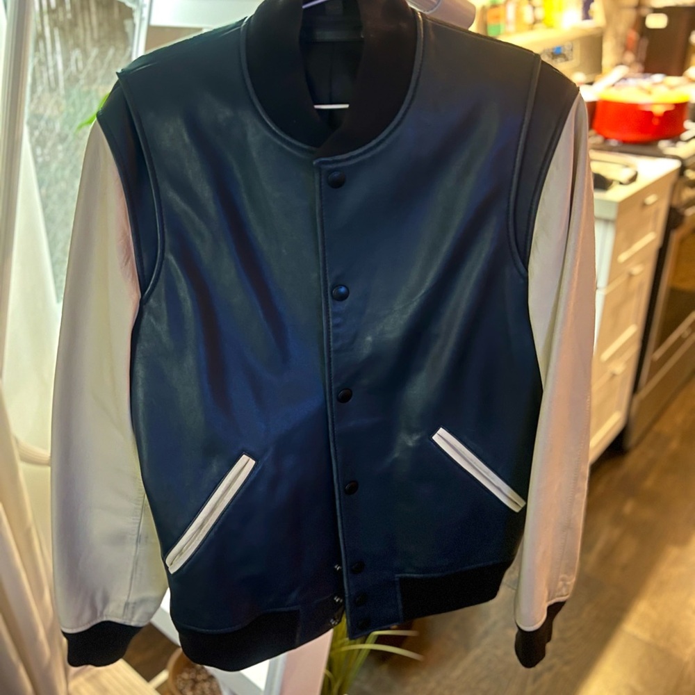 Coach navy and white soft leather varsity jacket. Excellent condition.